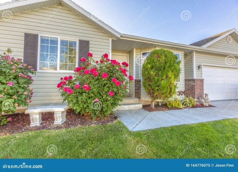 casa familiar con jardin y flores