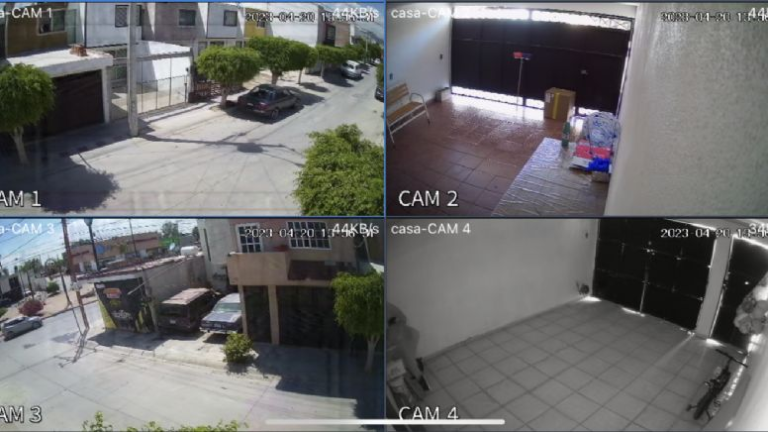 celular vigilando un hogar desde una esquina