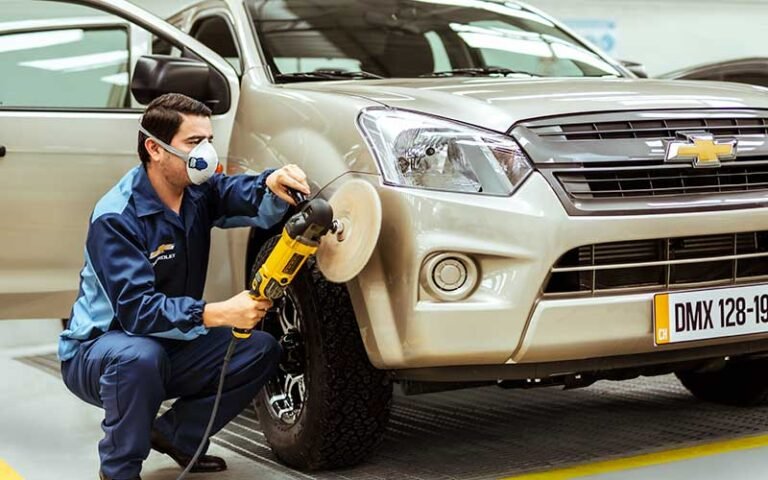 taller mecanico chevrolet con autos en servicio